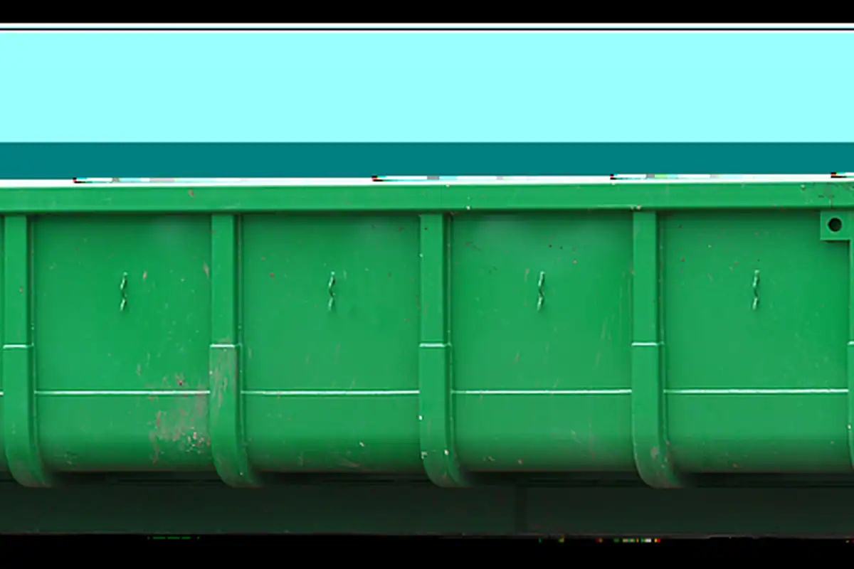 Container metalic pentru deșeuri de construcție, folosit la renovările din locuințe
